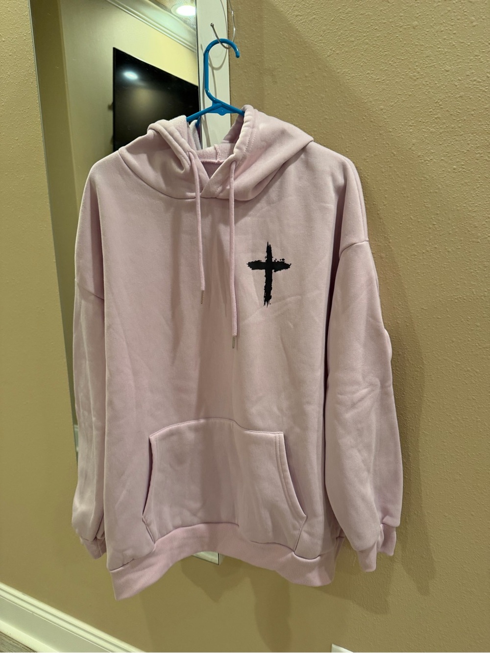 Source Unknown Light purpleHoodie with Black Cross Graphic
